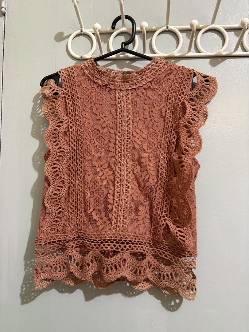 Dusty Pink Lace Sleeveless Top (Category: Sleeveless) located in Manila. Submitted by margascloset_ (Listing ID 1470474590, Image 1). Description: - Style: Dusty Pink Sleeveless top with high neckline and scalloped hem - Detail: Intricate all-over lace - Fit & Comfort: Fully lined body with a small back collar zipper closure - Condition: lightly used, has light yellow marks on the bottom front lace.