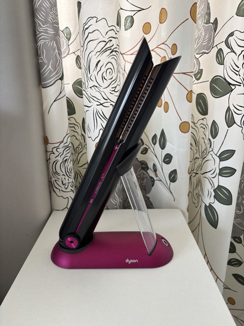 DYSON Corrale Straightener | BML Vault Philippines (Category: Hair) located in Cebu City. Submitted by bml_vault (Listing ID 1470396628, Image 3). Description: Dyson Corrale Straightener Color: Nickel/Fuschia SLIGHTLY Used No Box Includes: -Charging Port -Hear Resistant Travel Pouch -Magnetic 360 Degrees Charging Cable.