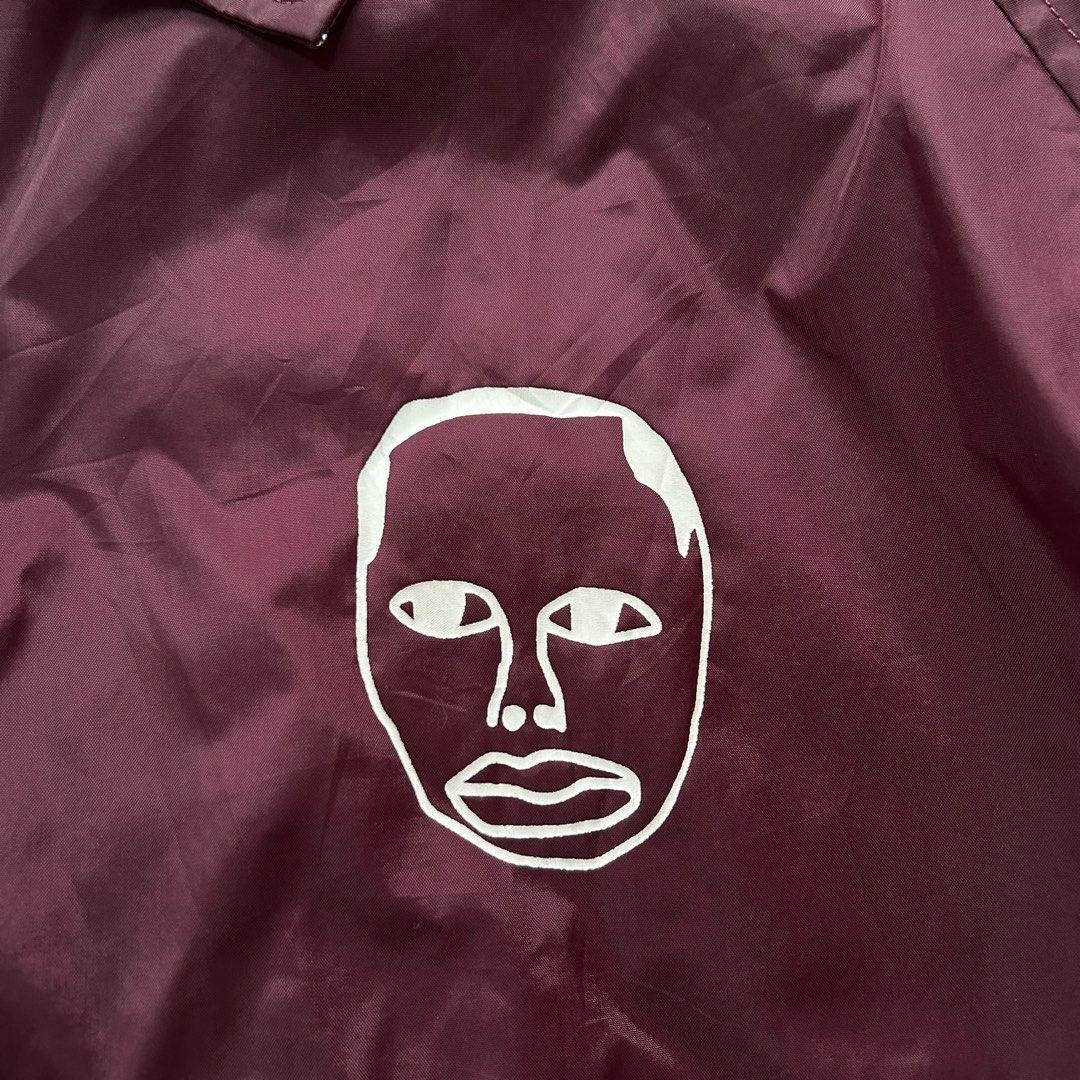 Earl Sweatshirt 1994 Coach Jacket 🥵 (Category: Coats, Jackets and Outerwear) located in Jinoba-an. Submitted by eegiboy (Listing ID 1470397506, Image 3). Description: - Item: Official Earl Sweatshirt Coach Jacket - Color: Maroon - Size: Medium - Details: White graphic face print on chest, bold '1994' print on back - Features: Snap button closure, pointed collar, elasticated cuffs - Material: 100% nylon shell with polyester lining Wts: 34rL Sweat