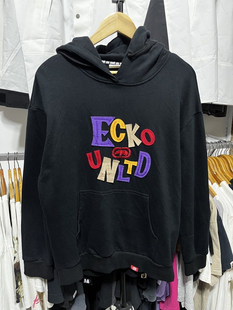 Ecko Unltd Black Hoodie Multi-color Logo Patch (Category: Coats, Jackets and Outerwear) located in Cabuyao City. Submitted by undergroundthrift03 (Listing ID 1470514730, Image 1). Description: ECKO UNLIMITED HOODIE JACKET Brand:Ecko Unlimited Dimes: 21 X 26.5 Colorate: 9.8/10 Condition: 9.8/10 Issue: None Mode of payment: Gcash (Pay now ship now) Mode of shipping: J&t Location: Cabuyao, Laguna.