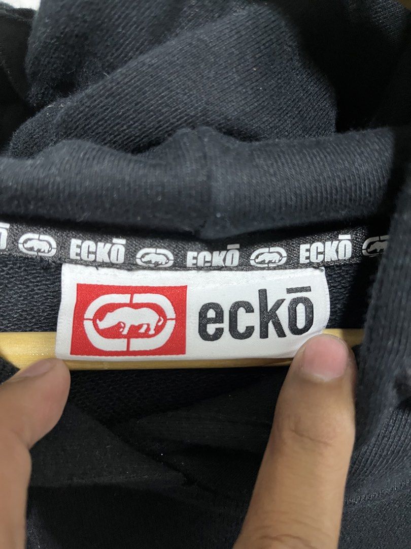 Ecko Unltd Black Hoodie Multi-color Logo Patch (Category: Coats, Jackets and Outerwear) located in Cabuyao City. Submitted by undergroundthrift03 (Listing ID 1470514730, Image 2). Description: ECKO UNLIMITED HOODIE JACKET Brand:Ecko Unlimited Dimes: 21 X 26.5 Colorate: 9.8/10 Condition: 9.8/10 Issue: None Mode of payment: Gcash (Pay now ship now) Mode of shipping: J&t Location: Cabuyao, Laguna.