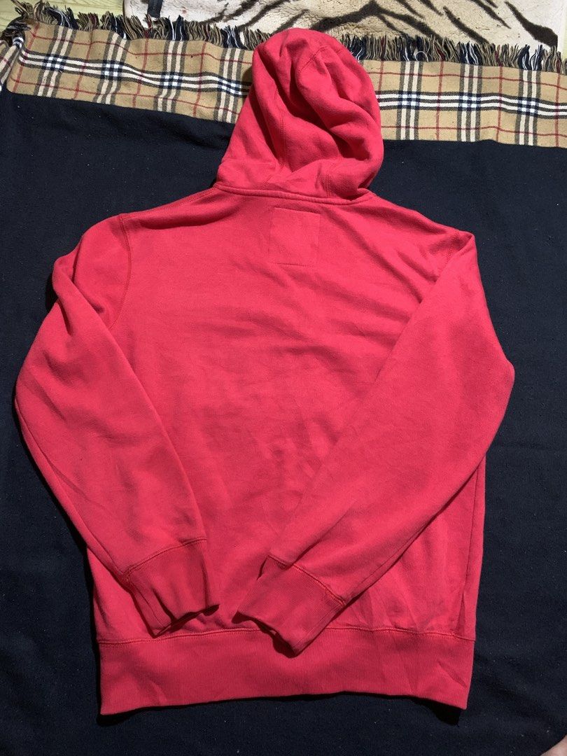 Ecko Unltd Red Zip-Up Hoodie (Category: Coats, Jackets and Outerwear) located in Cagayan de Oro. Submitted by chabermz (Listing ID 1470533464, Image 2). Description: - Brand: Ecko Unltd. - Color: Bright Red - Size: Small - Design: Large chest graphic with rhino logo and '1993' - Material: Cotton-polyester blend with soft fleece lining - Features: Attached hood with drawstrings, front pockets, ribbed cuffs, and hem - Issue cant lock the zipper Dim