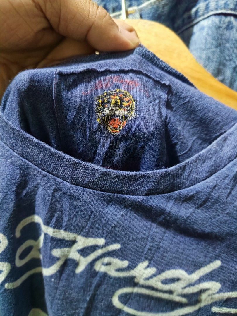 Ed hardy by Christian Audigier top (Category: Shirts) located in Cebu City. Submitted by negotiableprice22 (Listing ID 1470532457, Image 1). Description: Ed hardy by Christian Audigier Tunic Top.. size M Dimes width 15 inch length 31.5 inch issue small pin hole near the tag available accepting offers.