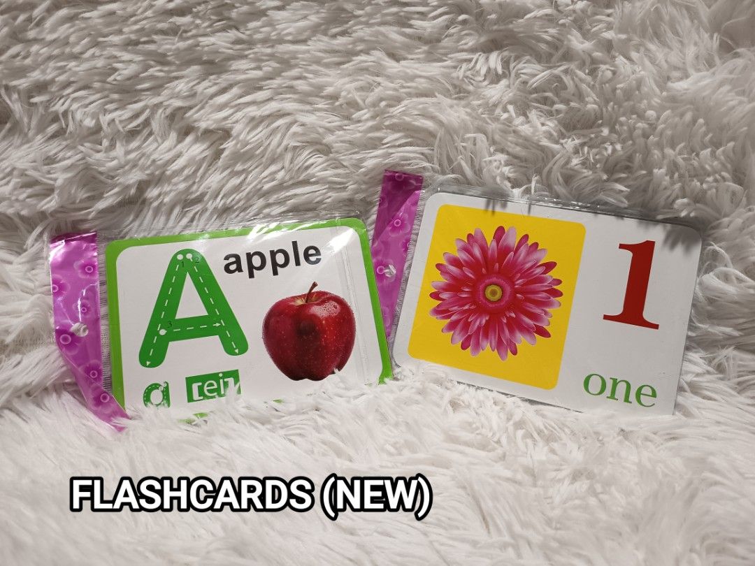 Educational Learning Flashcards Alphabet and Numbers (Category: Educational & Learning Toys) located in Manila. Submitted by riojariza55755 (Listing ID 1470432871, Image 1). Description: - Brand new, sealed in original packaging - Includes 2 packs: Alphabet (Letter A with apple) and Numbers (Number 1 with flower) - Features cute pink patterned headers - Ideal for toddlers and early learning - Great for teaching alphabet and counting skills.