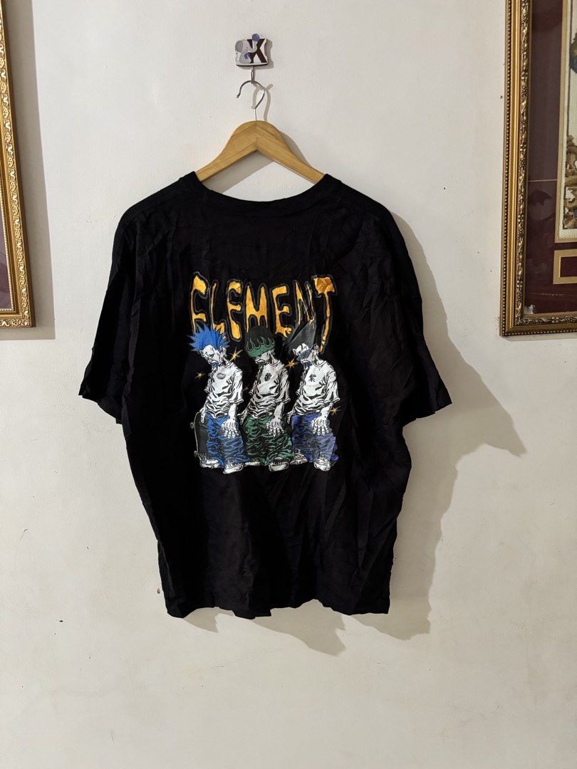 Element Skateboard Graphic Black T-Shirt (Category: Tshirts & Polo Shirts ) located in Kalibo. Submitted by mack29 (Listing ID 1470351671, Image 2). Description: - Brand: Element - Color: Black - Size: Large - Design: Large skater cartoon print on the back with yellow branding, small front logo, and 'Ride Life' Japanese text patch - Fit/Feel: Short sleeves, crew neck, soft and relaxed material - Style: Perfect for casual and streetwear looks - Co