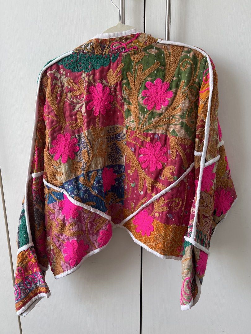 Elinora Kaia Reversible Patchwork Quilted Jacket BNWT (Category: Coats, Jackets and Outerwear) located in Mandaluyong City. Submitted by mpdlpz (Listing ID 1470354490, Image 2). Description: Reversible handmade crop jacket from Elinora. Crafted from vintage Kantha textiles using traditional hand-stitched quilting techniques. One side features multicolor patchwork prints with vibrant pink floral embroidery and white piping trim. Flip it over for a