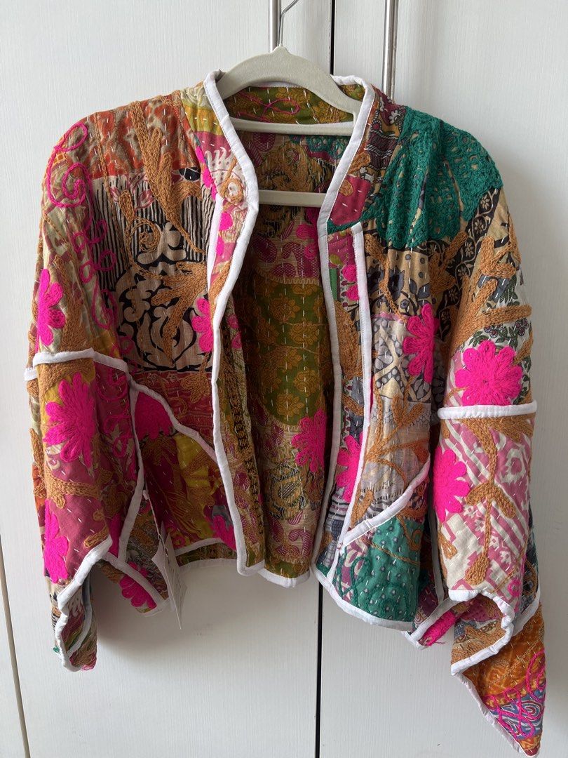 Elinora Kaia Reversible Patchwork Quilted Jacket BNWT (Category: Coats, Jackets and Outerwear) located in Mandaluyong City. Submitted by mpdlpz (Listing ID 1470354490, Image 1). Description: Reversible handmade crop jacket from Elinora. Crafted from vintage Kantha textiles using traditional hand-stitched quilting techniques. One side features multicolor patchwork prints with vibrant pink floral embroidery and white piping trim. Flip it over for a