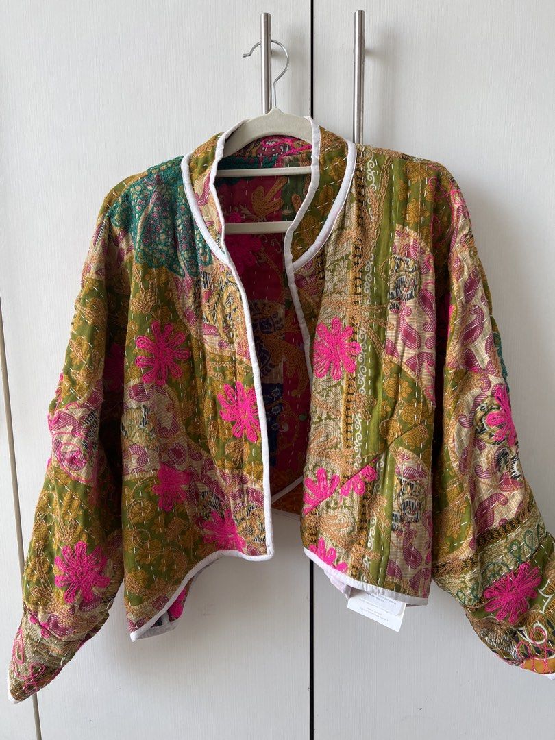 Elinora Kaia Reversible Patchwork Quilted Jacket BNWT (Category: Coats, Jackets and Outerwear) located in Mandaluyong City. Submitted by mpdlpz (Listing ID 1470354490, Image 3). Description: Reversible handmade crop jacket from Elinora. Crafted from vintage Kantha textiles using traditional hand-stitched quilting techniques. One side features multicolor patchwork prints with vibrant pink floral embroidery and white piping trim. Flip it over for a
