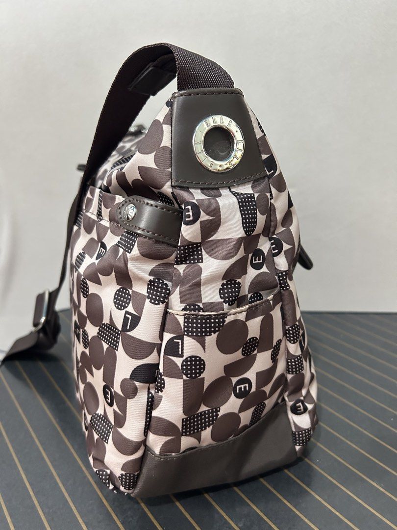 Elle Brown Sling Bag (Category: Cross-body Bags) located in Quezon City. Submitted by jjsurplus_23 (Listing ID 1470381568, Image 2). Description: .