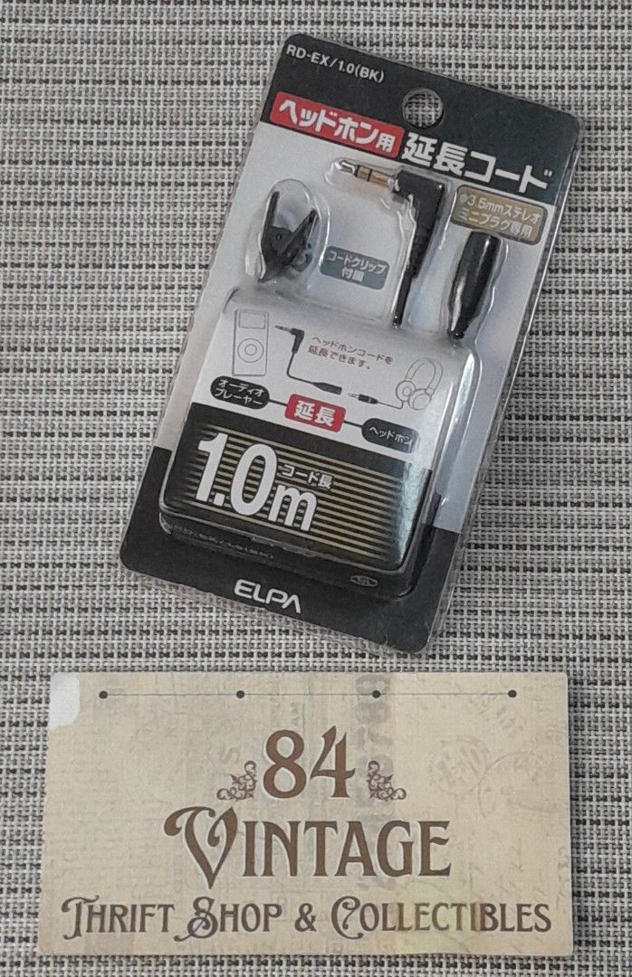 ELPA Headphone Extension Cord (Category: Vintage Collectibles) located in Las Pinas. Submitted by 84vintage (Listing ID 1470407323, Image 1). Description: ELPA Headphone Extension Cord which is a 1-meter 3.5mm stereo audio extension cable. With a handy cord clip to secure excess wire. Connectors: 3.5mm stereo mini plug (male) to 3.5mm stereo mini jack (female) Actual photos posted. Please examine them carefully as they are part of the description
