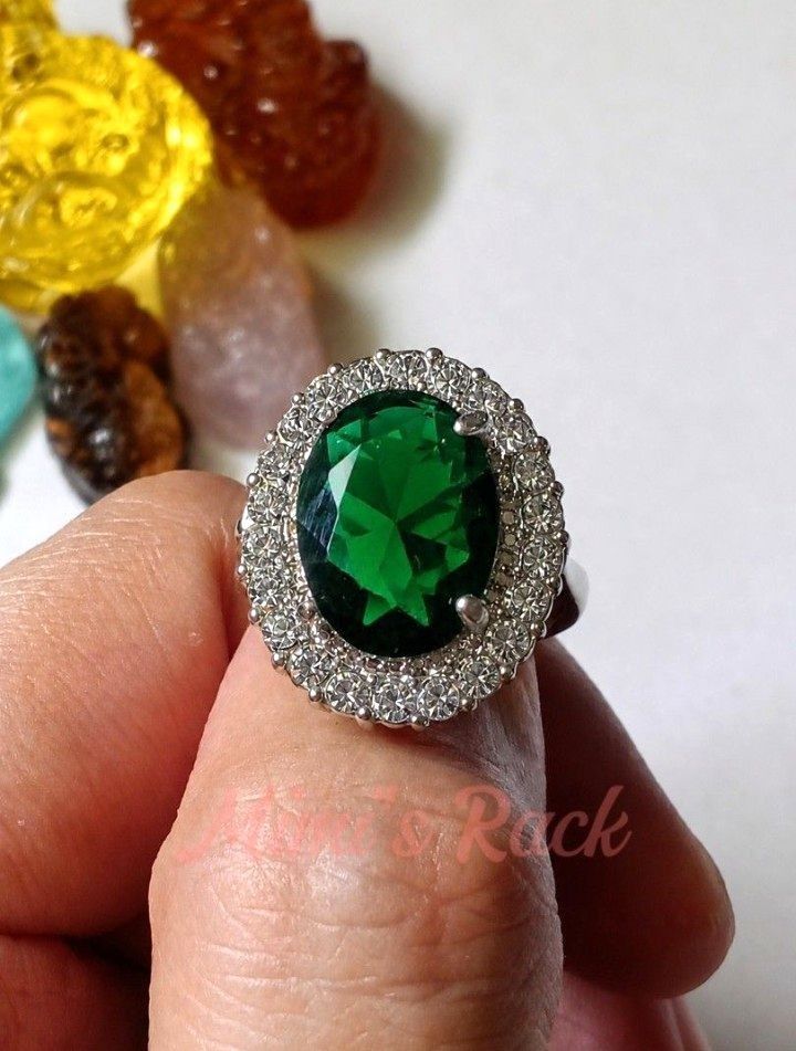 Emerald Oval Halo Ring (Category: Rings) located in Taguig. Submitted by mimisrack (Listing ID 1470379326, Image 1). Description: 💚 💰 Wealth & Prosperity — emerald is traditionally associated with abundance, financial success, and business growth. 🍀 Good Luck & Fortune — symbolizes blessings, favorable opportunities, and success. ❤️ Love & Loyalty — represents devotion, trust, and lasting relationships. 🧘 Emotional Balance — associated with h