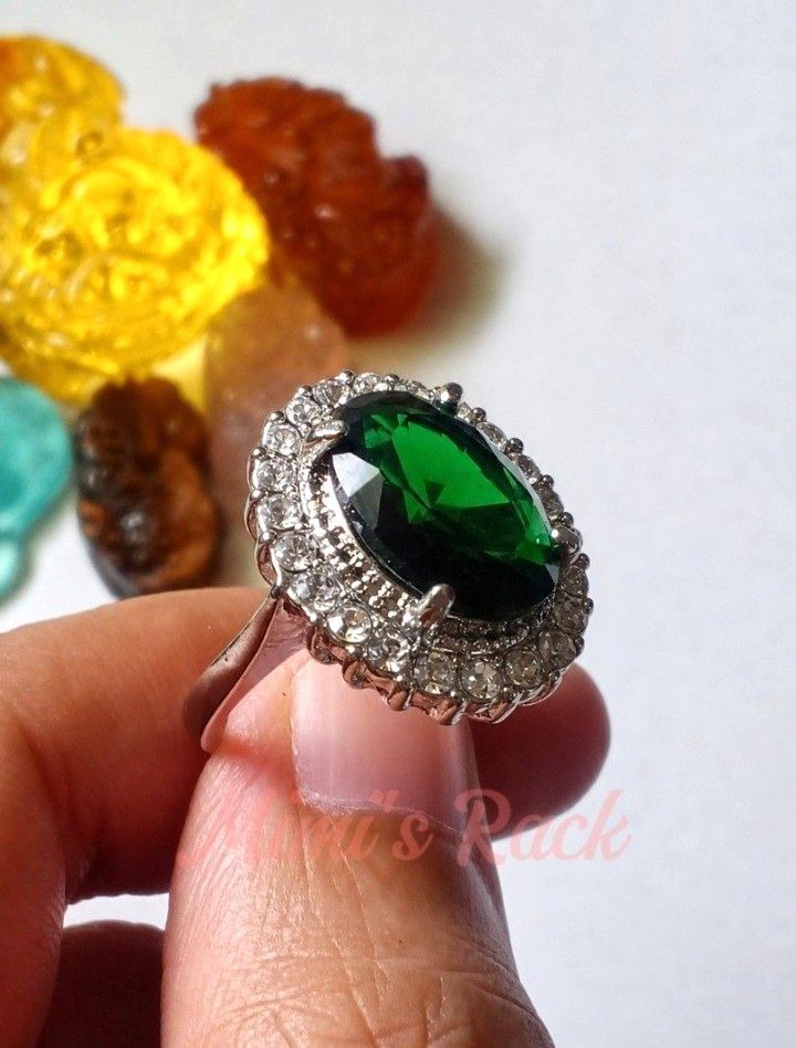 Emerald Oval Halo Ring (Category: Rings) located in Taguig. Submitted by mimisrack (Listing ID 1470379326, Image 2). Description: 💚 💰 Wealth & Prosperity — emerald is traditionally associated with abundance, financial success, and business growth. 🍀 Good Luck & Fortune — symbolizes blessings, favorable opportunities, and success. ❤️ Love & Loyalty — represents devotion, trust, and lasting relationships. 🧘 Emotional Balance — associated with h