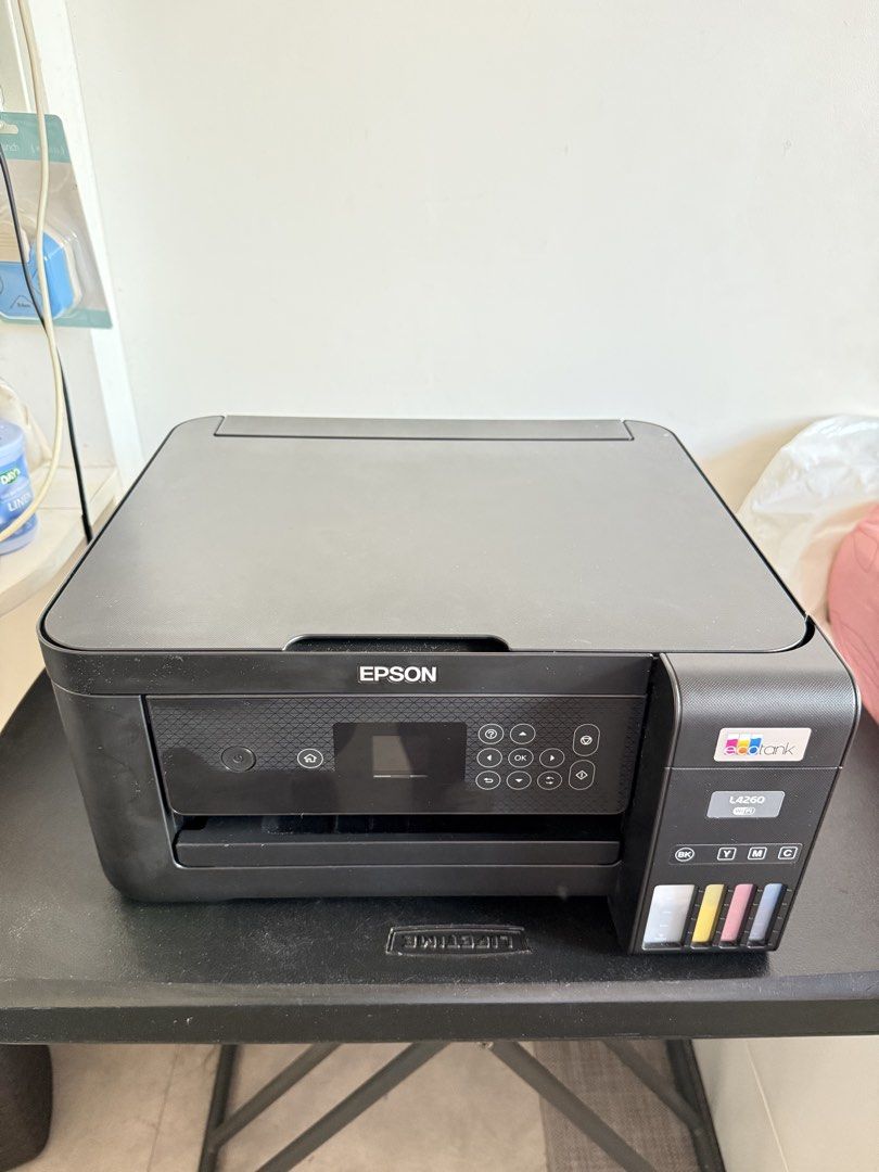 Epson EcoTank L4260 (Category: Printers, Scanners & Copiers) located in Manila. Submitted by ch11ng (Listing ID 1470359019, Image 2). Description: - Epson L4260 Ecotank Printer - Pigment Ink - Reason for Selling: No time to fix - Location: Bacoor, Cavite - Honest Issues: - Cover affected by acetone residue removal - Broken screw holder on scanner hinge - Missing line in blue ink on printouts .