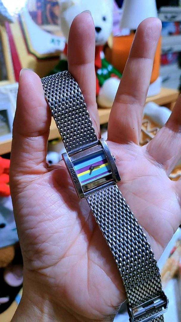 Esprit multicolored striped rectangular watch with metal mesh strap (Category: Women's Watches) located in Baliuag. Submitted by marieannfernando23 (Listing ID 1470367617, Image 1). Description: - Brand: Esprit - Design: Rectangular face with vibrant blue, purple, yellow, and pink horizontal stripes - Strap: Silver-tone metal mesh with secure clasp closure - Details: Esprit branding stamped on the top bezel - Style: Works great as a chic wrist ac