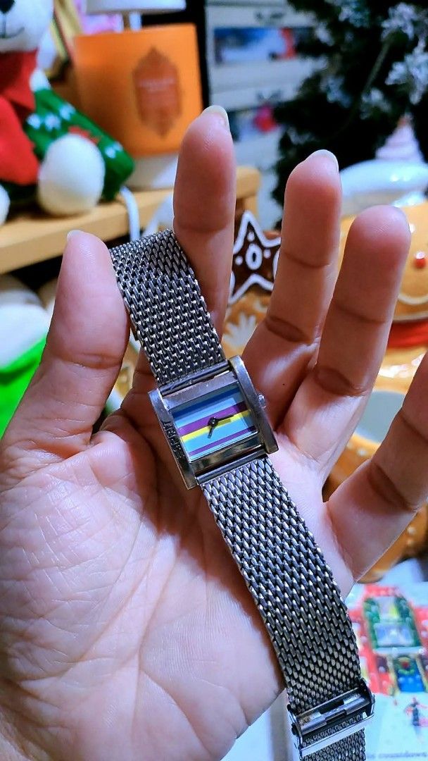 Esprit multicolored striped rectangular watch with metal mesh strap (Category: Women's Watches) located in Baliuag. Submitted by marieannfernando23 (Listing ID 1470367617, Image 2). Description: - Brand: Esprit - Design: Rectangular face with vibrant blue, purple, yellow, and pink horizontal stripes - Strap: Silver-tone metal mesh with secure clasp closure - Details: Esprit branding stamped on the top bezel - Style: Works great as a chic wrist ac