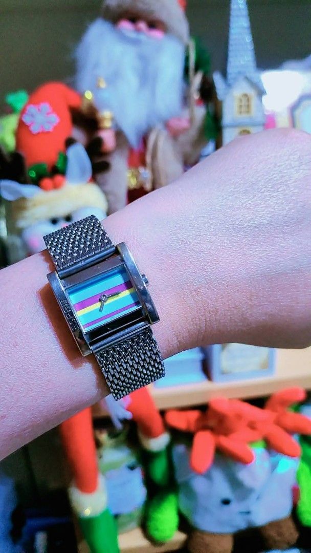Esprit multicolored striped rectangular watch with metal mesh strap (Category: Women's Watches) located in Baliuag. Submitted by marieannfernando23 (Listing ID 1470367617, Image 3). Description: - Brand: Esprit - Design: Rectangular face with vibrant blue, purple, yellow, and pink horizontal stripes - Strap: Silver-tone metal mesh with secure clasp closure - Details: Esprit branding stamped on the top bezel - Style: Works great as a chic wrist ac