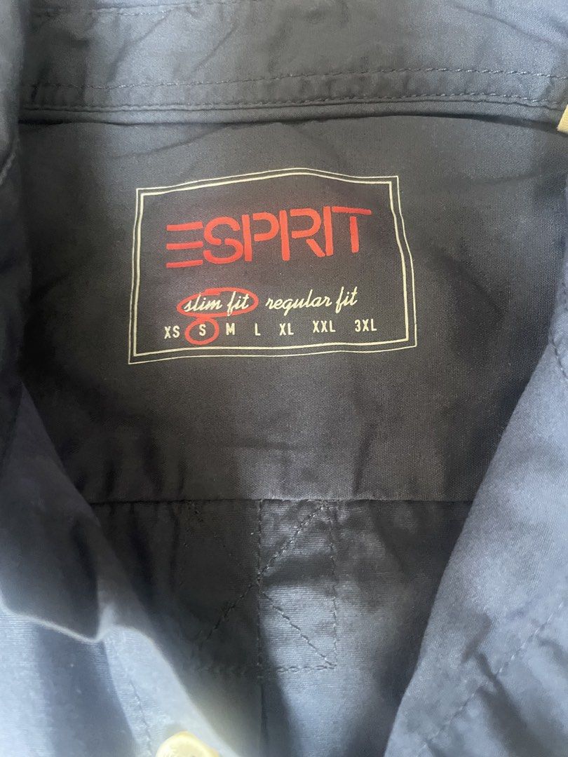Esprit Navy Blue Slim Fit Button-Down Shirt Size S (Category: Tshirts & Polo Shirts ) located in Quezon City. Submitted by azrah_04 (Listing ID 1470360620, Image 2). Description: - Brand: Esprit - Style: Slim fit button-down shirt - Color: Navy blue / Solid dark blue - Size: Small - Material: 100% cotton - Details: Long sleeves with button cuffs, collar neckline, front button closure .