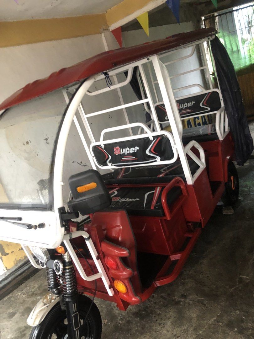 E-trike 3 wheels (Category: Other Motorcycles Parts and Accessories) located in Quezon City. Submitted by shndmndz. (Listing ID 1470354707, Image 1). Description: 3 WHEELS ELECTRIC TRIKE WITH HIGH POWER 6-8 SEATERS Specifications: 📍6-8 seating capacity 📍With 2 spare battery compartment 📍1500W motor 📍60v45ah battery 📍Front and rear drum brake 12x4.0 tire 📍Automatic wiper 📍Digital panel 📍With Voltmeter 📍 Side mirror 📍500kgs maximum capaci
