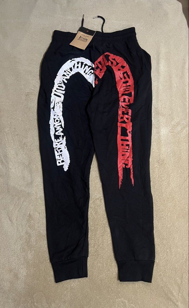 Evisu Daicock Pants - Black (Category: Joggers) located in Cebu City. Submitted by jlturno1999 (Listing ID 1470383626, Image 1). Description: Evisu Daicock Pants - Black With hangtag Good as new condition 29-36 waistline adjustable, 41 length 9.8/10 color rate Minor need wash stain white print .