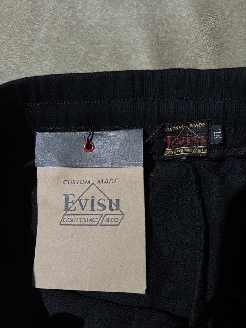 Evisu Daicock Pants - Black (Category: Joggers) located in Cebu City. Submitted by jlturno1999 (Listing ID 1470383626, Image 3). Description: Evisu Daicock Pants - Black With hangtag Good as new condition 29-36 waistline adjustable, 41 length 9.8/10 color rate Minor need wash stain white print .