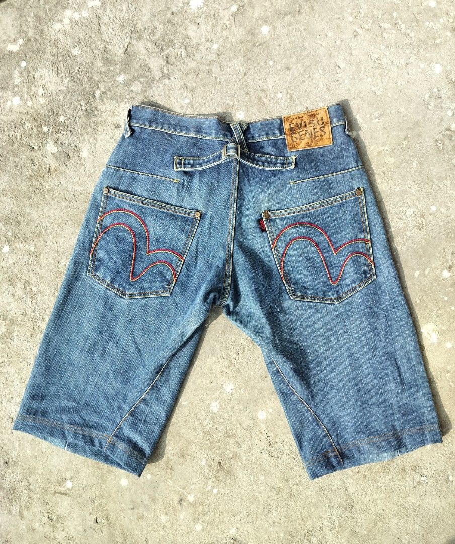 EVISU JORTS SIZE 30 (Category: Shorts) located in Manila. Submitted by gcarchives (Listing ID 1470494574, Image 2). Description: EVISU GENES JORTS 30 WAISTLINE | 24 LENGTH EXCELLENT CONDITION COLOR RATE 9.5/10 AUTHENTIC | COMPLETE TAGS ISSUE: FADED PATCH | NEED WASH.
