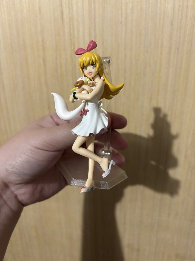 FigFix Oshino Shinobu (Category: Figurines & Statues) located in Muntinlupa City. Submitted by codegrey (Listing ID 1470503978, Image 1). Description: - Character: Shinobu Oshino holding Kyubey .