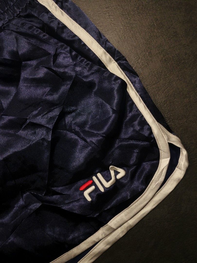 Fila Nylon Athletic Track Shorts (Category: Shorts) located in Kalibo. Submitted by relivethearchives (Listing ID 1470421052, Image 2). Description: Fila Nylon Athletic Track Shorts as New Condition ( Hangtag still intact) DIMES Waist: 28 stretch up to 33 Length: 12.