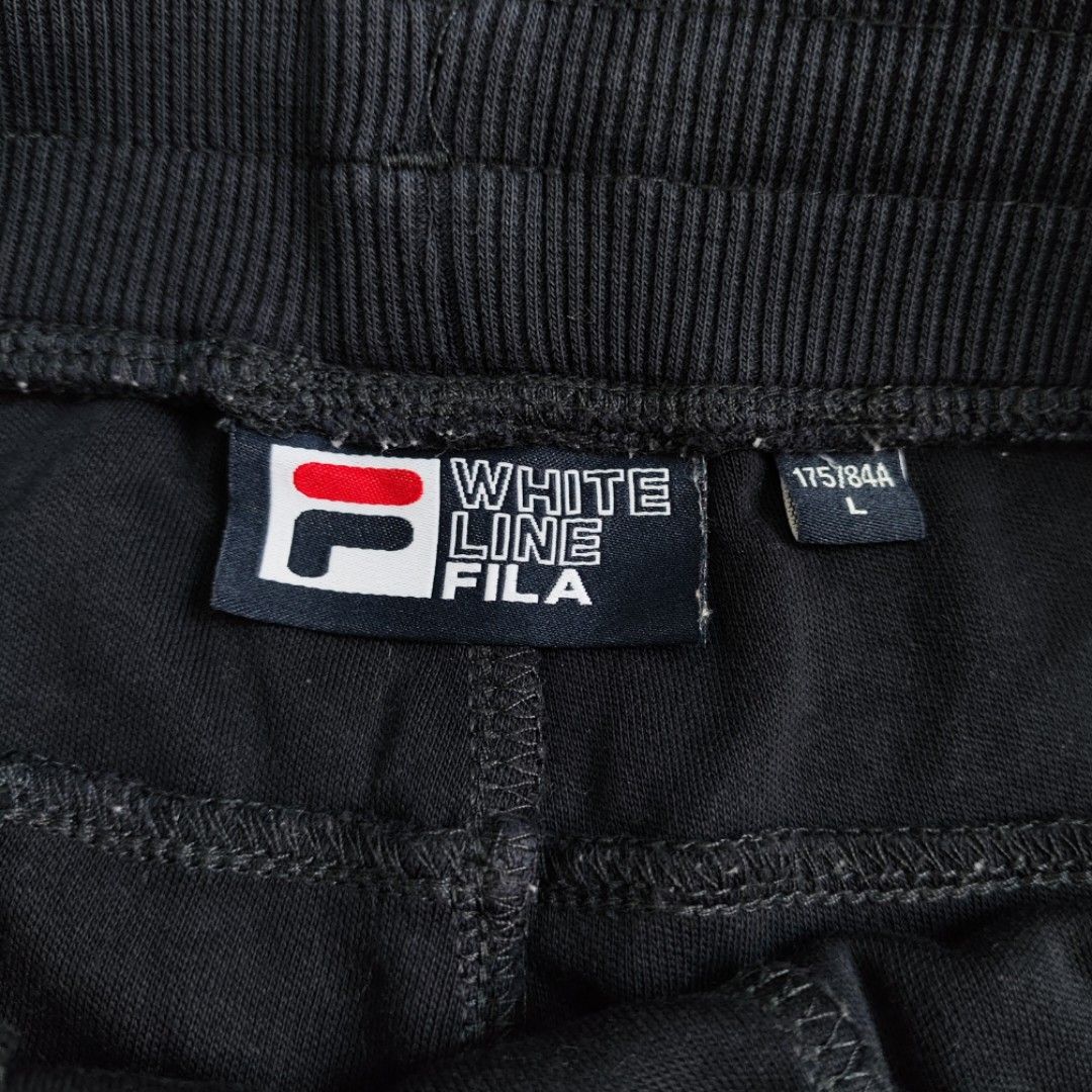 Fila White Line Shorts (Category: Shorts) located in Rosales. Submitted by kudoscache (Listing ID 1470441423, Image 3). Description: - Brand: Fila - Waist: 29-38 | Length: 21 - Color: Black - slightly nego payment: maribank / gotyme courier: J&T.
