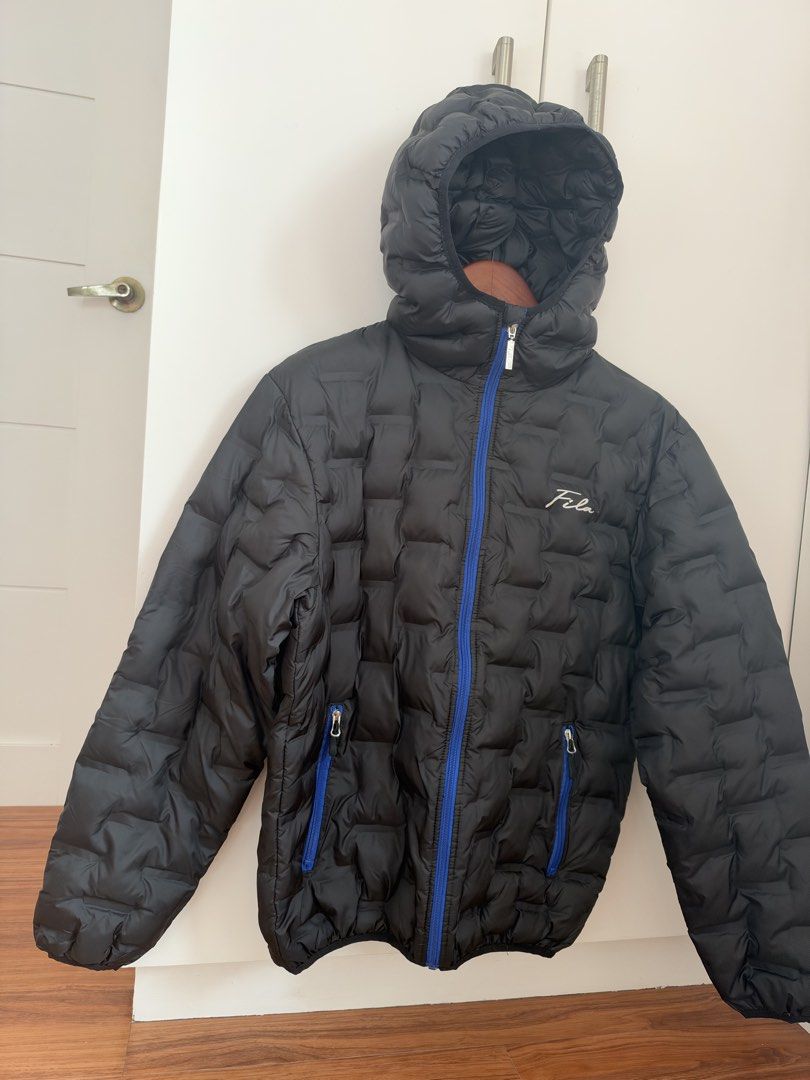 Fila winter Puffer jacket (Category: Coats, Jackets and Outerwear) located in Quezon City. Submitted by mikeylachua29 (Listing ID 1470438910, Image 2). Description: Good as new Used once Large for mens.