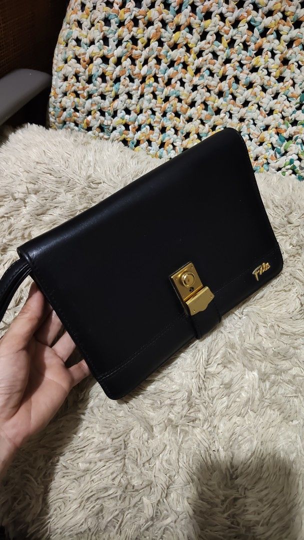 Fila... wristlet/clutch (Category: Belt bags, Clutches and Pouches) located in Cebu City. Submitted by lumaynojes00490 (Listing ID 1470498368, Image 3). Description: good condition leather .