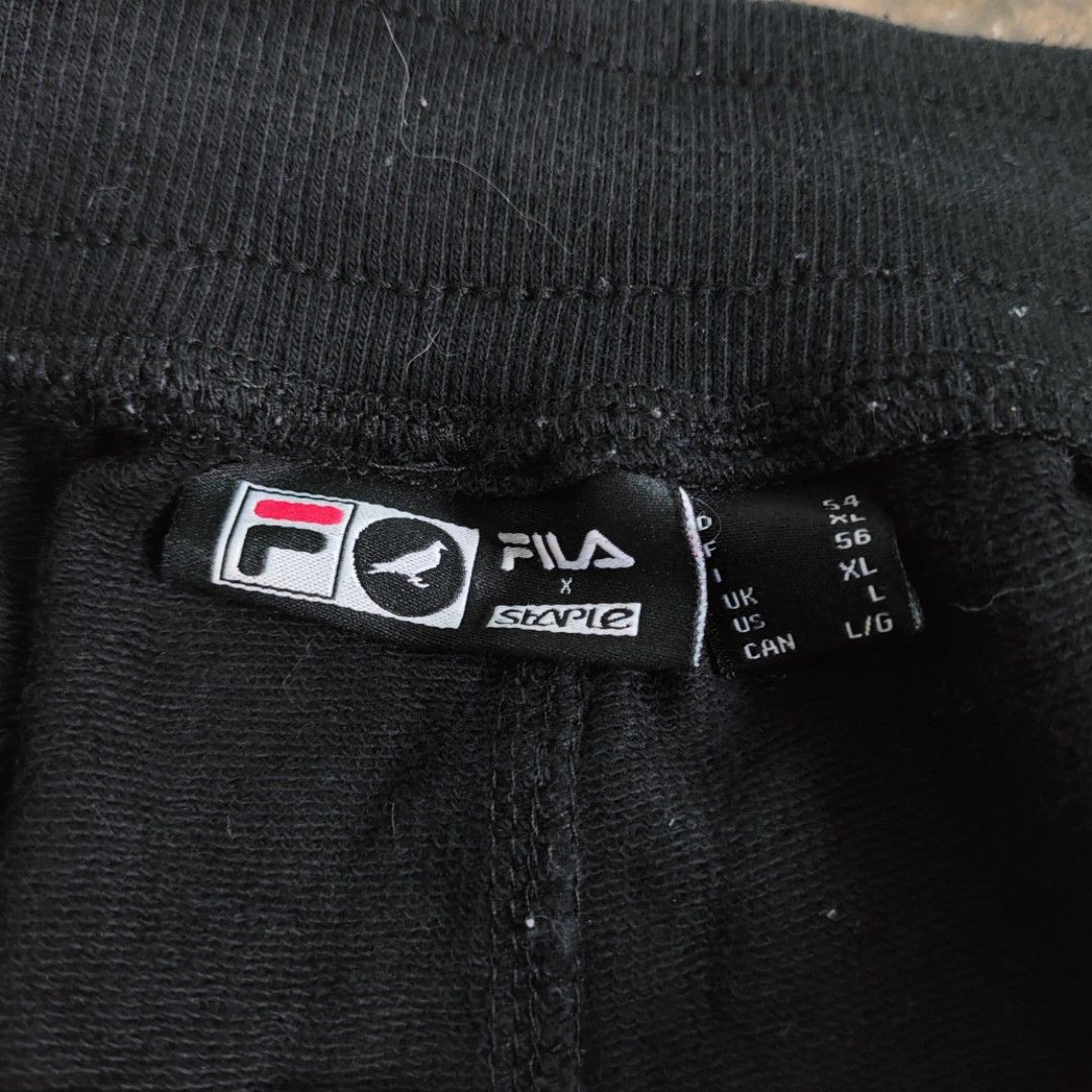 Fila x Staple Cotton Shorts (Category: Shorts) located in Rosales. Submitted by kudoscache (Listing ID 1470440996, Image 3). Description: - Brand: Fila - Waist: 27-38 | Length: 22 - Color: Black - slightly nego payment: maribank / gotyme courier: J&T.