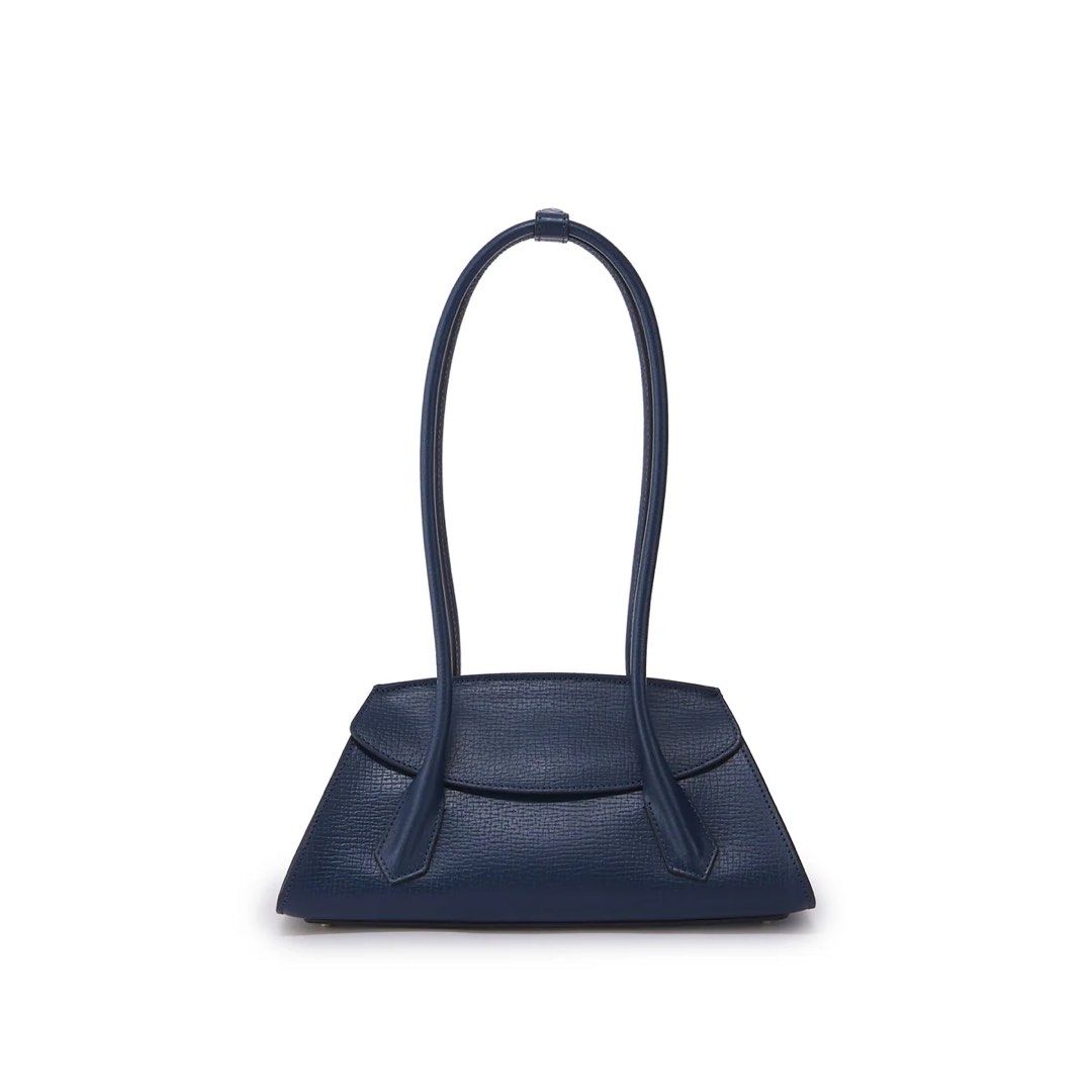 Fino Leatherware Mini Yorker Navy Blue Shoulder Bag (Category: Shoulder Bags) located in Quezon City. Submitted by cheekbuns (Listing ID 1470364702, Image 1). Description: - Brand: Fino Leatherware - Style: Structured east west shoulder bag 12 x 5.5 x 4.5 x 10” - Material: Premium textured blue leather - Features: Double top handles, clean flap closure, pristine interior and exterior - Inclusions: Original dust bag and attached brand tag.