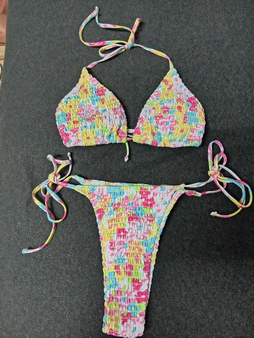 Floral Bikini with free cover-up (Category: Bikinis & Swimsuits) located in Manila. Submitted by babymango25 (Listing ID 1470490129, Image 1). Description: Bought it on orange app Size XS-Small Padded Used once (Cover-up included).