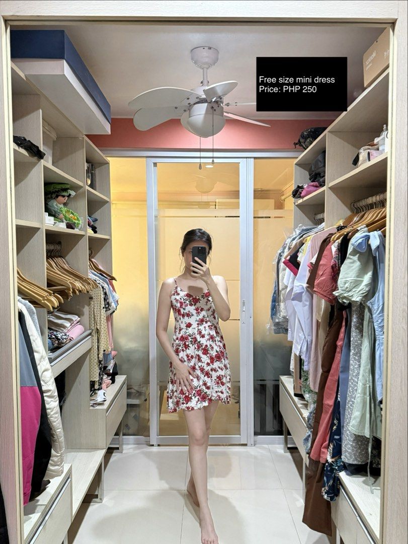 Floral Mini Dress Free Size (Category: Dresses) located in Makati City. Submitted by thrift.plethora (Listing ID 1470492817, Image 1). Description: - Design: White mini dress with an all-over red rose print - Cut: Spaghetti straps, sleeveless, short length (above the knee) - Material: Lightweight and breathable fabric - Vibe: Casual, chic, and easy to style - Condition: Brand new / Excellent - Mode of Payment: Gcash / BPI accepted - Shipping: Fas