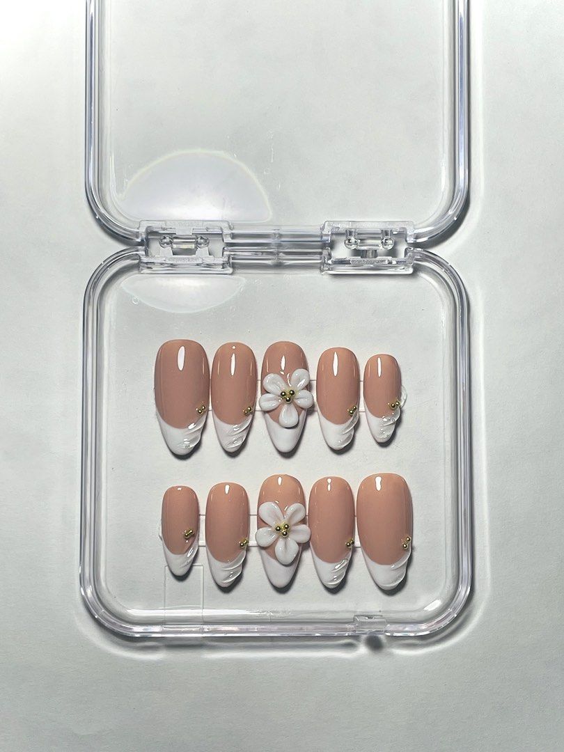 Floral press on nails (Category: Hands & Nails) located in Manila. Submitted by nailarchitech.co (Listing ID 1470513145, Image 1). Description: Size: small Shape: almond Length: long •includes prep/application kit when purchased • handmade & reusable Message us on IG @nailarchitech.co for further inquiries!.