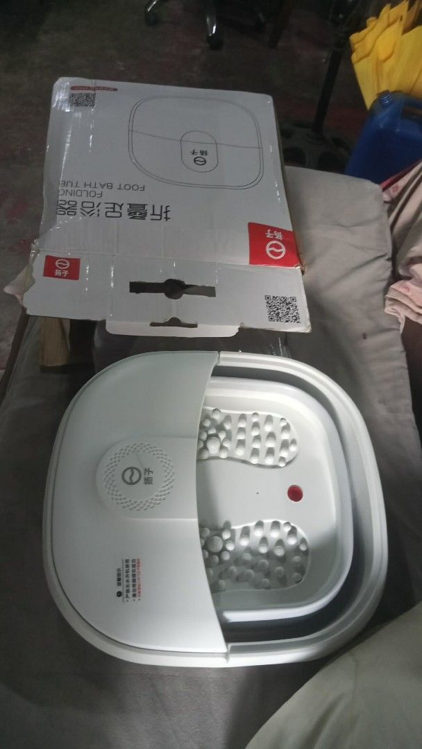 Folding Foot Bath Tub Massager (Category: Bathtub & Bath Accessories) located in Manila. Submitted by wisegem-231b (Listing ID 1470393822, Image 1). Description: - Electric folding foot bath tub with relaxing massage rollers - Space-saving collapsible design for easy storage - Plug-and-play operation for ultimate convenience at home - Comes with original box - Condition: Like new / Great for self-care.