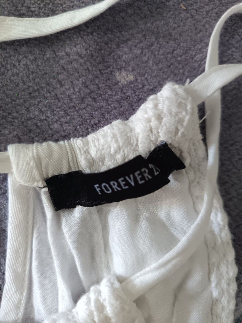 Forever21 (Category: Dresses) located in Cavite. Submitted by vin2za06 (Listing ID 1470433049, Image 2). Description: This white sleeveless mini playsuit is the forever 21 in off-white.