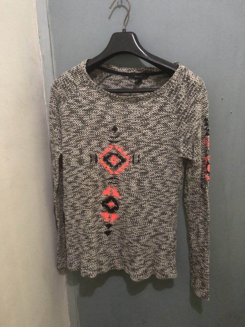 Forever 21 Aztec Print Knit Sweater Grey Size S (Category: Longsleeves) located in Quezon City. Submitted by unique2shop (Listing ID 1470404324, Image 1). Description: - Brand: Forever 21 - Size: S (tag attached inside collar) - Color: Grey, white, with black and neon pink Aztec diamond pattern - Style: Crew neckline, long sleeves, regular fit - Material: Textured knit fabric - Condition: Clean, no flaws noticed - MOP. GCASH - DELIVERY. GRAB - SH