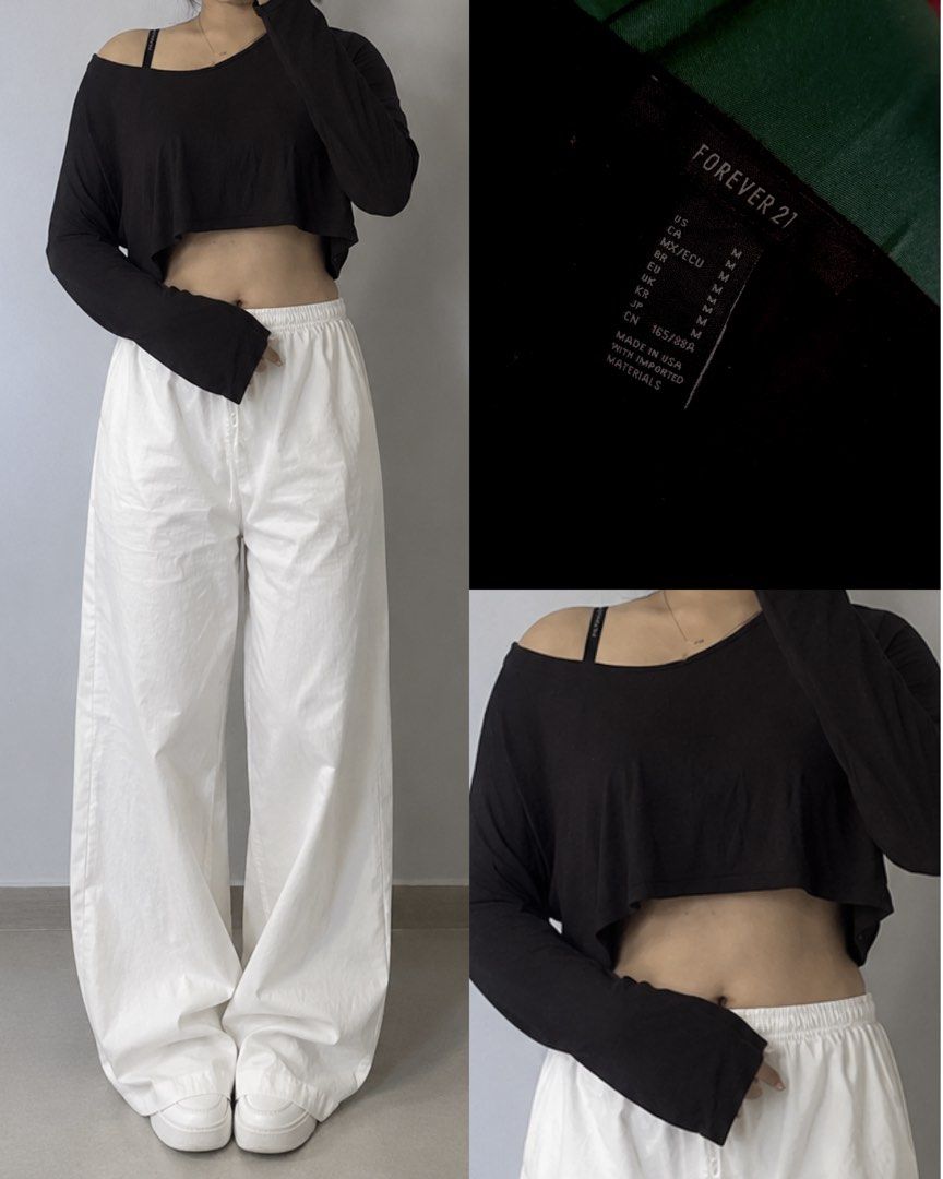 Forever 21 Black Long Sleeve Crop Top Size M (Category: Longsleeves) located in Manila. Submitted by coolflower-e6627b (Listing ID 1470489825, Image 1). Description: - Brand: Forever 21 - Size: M - Color: Black - Style: Long sleeve off-shoulder crop top with a boat neckline - Material: Soft and stretchy jersey fabric - Condition: Clean and ready to wear - Pairing tip: Looks great with high-waisted pants.