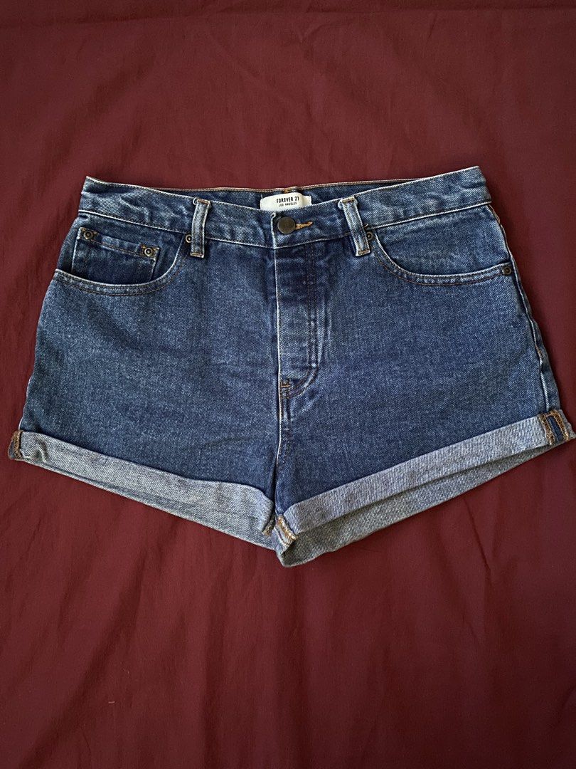 Forever 21 Cuffed Denim Shorts (Category: Shorts) located in Manila. Submitted by love_mami (Listing ID 1470439586, Image 1). Description: - Brand: Forever 21 - Conditions: 9-10 used twice malutong pa - Color: Dark blue denim - Size: 27-28 waist - Details: Rolled cuffs, classic five-pocket design, belt loops, button and zip fly closure - Origin: Made in China.