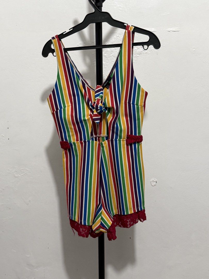 Forever 21 Rainbow Striped Romper with Lace Trim (Category: Rompers) located in Mandaluyong City. Submitted by jdflores17 (Listing ID 1470454687, Image 2). Description: - Brand: Forever 21 - Design: Bright rainbow stripe pattern with cute maroon lace trim - Details: Sleeveless, front tie bust, and convenient back zipper closure - Perfect for: Casual sunny days, music festivals, or pride events - Condition: Excellent, ready to wear!.