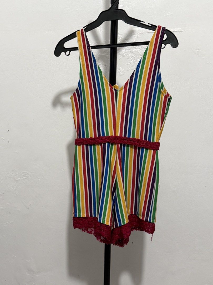 Forever 21 Rainbow Striped Romper with Lace Trim (Category: Rompers) located in Mandaluyong City. Submitted by jdflores17 (Listing ID 1470454687, Image 1). Description: - Brand: Forever 21 - Design: Bright rainbow stripe pattern with cute maroon lace trim - Details: Sleeveless, front tie bust, and convenient back zipper closure - Perfect for: Casual sunny days, music festivals, or pride events - Condition: Excellent, ready to wear!.