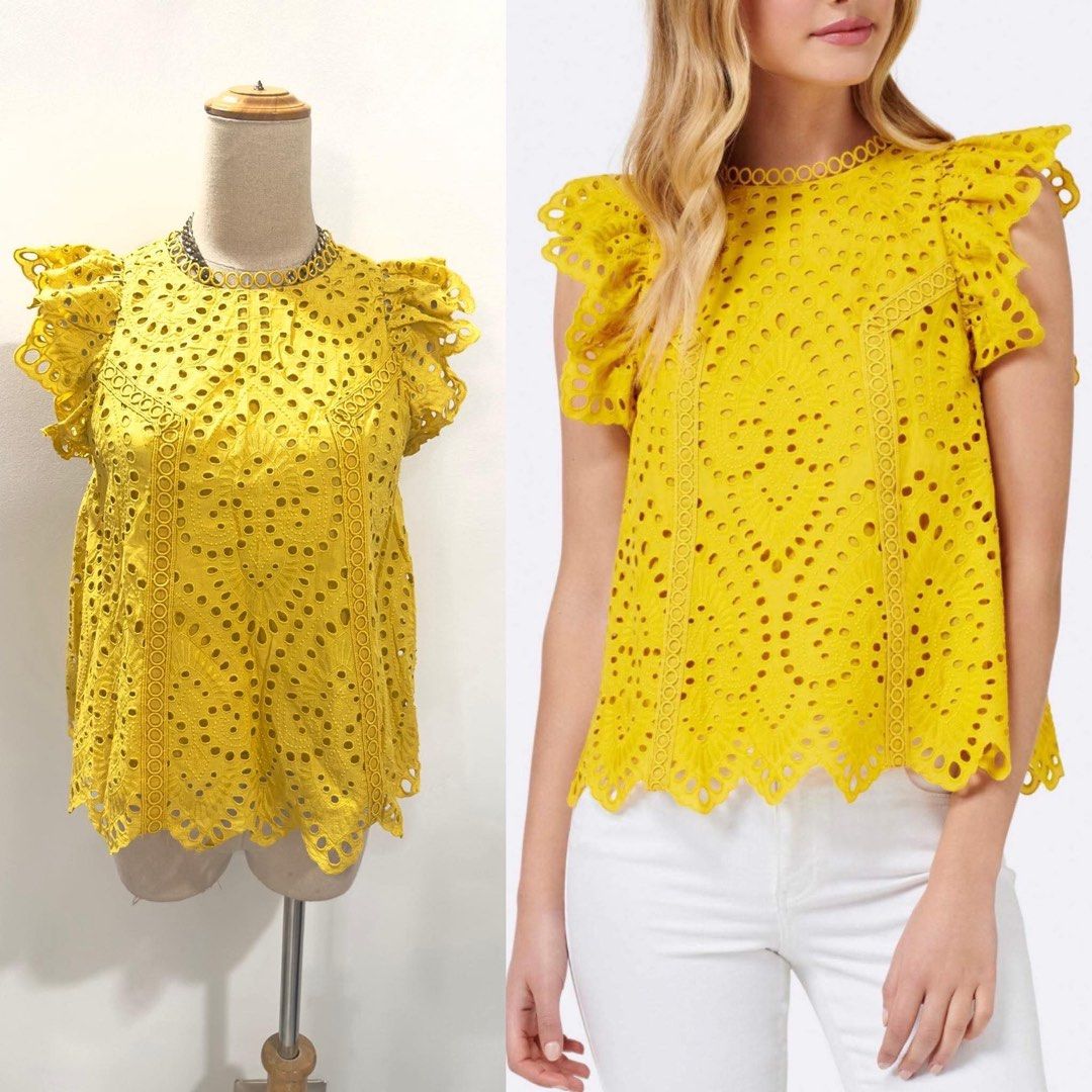 Forever New Yellow Eyelet Ruffle Sleeve Blouse (Category: Blouses) located in Bacolod City. Submitted by bhabissagal-05763 (Listing ID 1470401987, Image 2). Description: - Brand: Forever New - Size: AUS 6 / EUR 34 / USA 2 - Color: Bright yellow - Material: Lightweight cotton with allover cutwork embroidery - Details: Ruffle cap sleeves, scalloped hem, and button keyhole back closure - Condition: Great pop of color for sunny days.