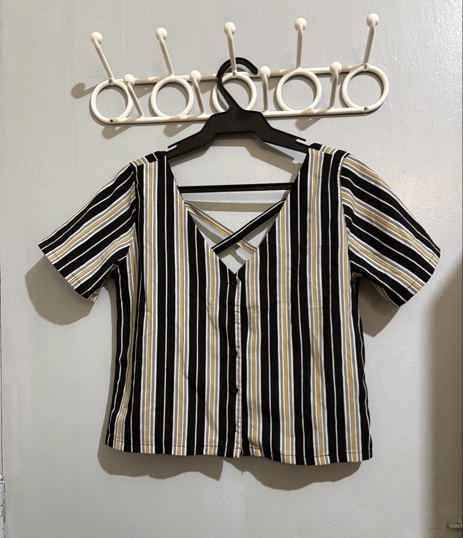 Forme Striped Button-Down Blouse With Crossback Detail (Category: Blouses) located in Manila. Submitted by margascloset_ (Listing ID 1470469791, Image 1). Description: - Design: Black, white, and yellow stripes with small black buttons - Condition: Clean and ready to wear .