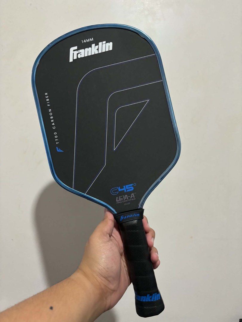 Franklin C45 Hybrid Paddle (Category: Racket and Ball Sports) located in Cavite. Submitted by justinnechiu (Listing ID 1470474138, Image 1). Description: Helping a friend: Franklin C45 Pickleball Paddle 14mm For maximum spin and control Edge guard has visible scuffs from regular court play, but performance remains solid Bought in Chris Sports Makati RFS: Upgrade paddle to Omni. Slightly Nego.