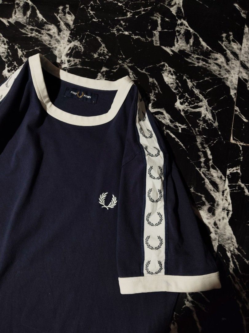 FRED PERRY SIDE TAPE (Category: Tshirts & Polo Shirts ) located in Hinigaran. Submitted by formalwear.ph (Listing ID 1470410449, Image 2). Description: WTS 📌📌📌 •(FRED PERRY SIDE TAPE)• •Excellent Condition •Size-S •Dimes- 18 by 26 •Cr -9.5/10 •Flaws- Cutwashtag •Washed ✅ •Color may vary due to lightings •Very Presentable to weaR PHP 📥+ sf Affordable ✅ NOTE : If interested kindly message me directly bcause my account is underlimit for sending 