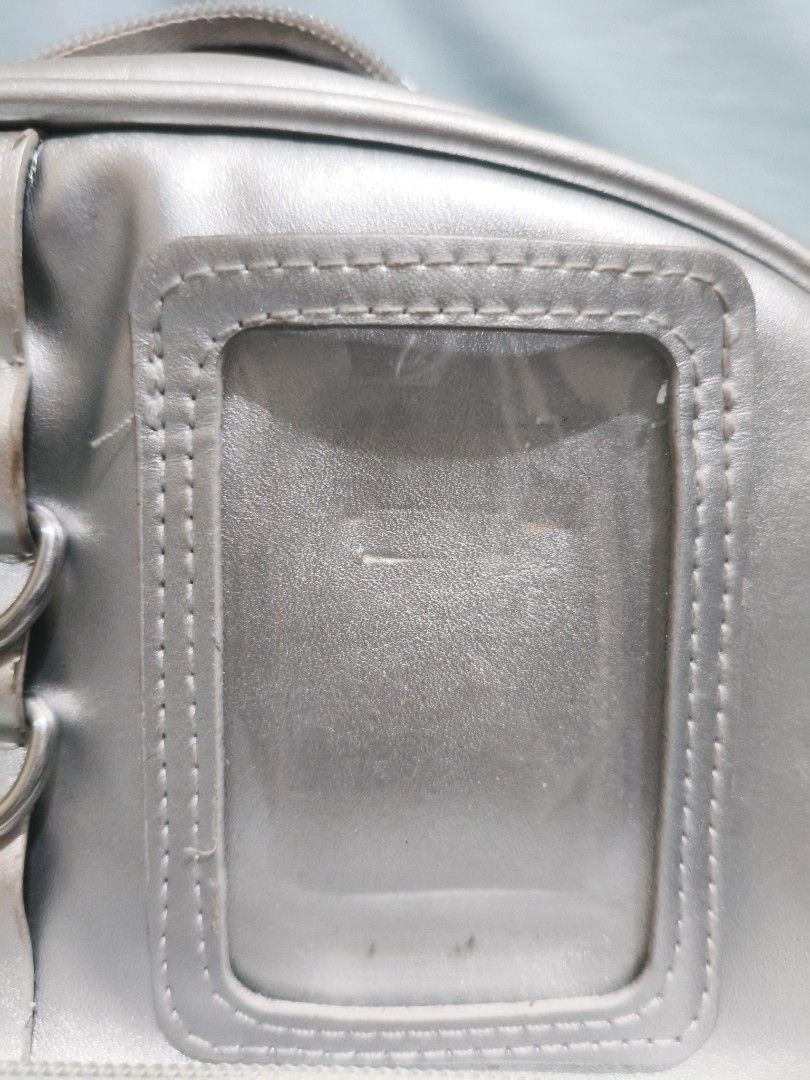 Free Shipping | Pre loved Silver Backpack Itabag (Category: Backpacks) located in Paranaque City. Submitted by nischmweh (Listing ID 1470532022, Image 3). Description: MOP: GCASH/MAYA/MARIBANK MOD: J&T PAYO - Pay As You Order Issues • A little bit dirty • some parts are rusting(?) • Marks on the Photocard pocket as what I put there is a rectangle Pin Other than those issues it's still good to use. Originally bought for ₱460 rfs: change to another