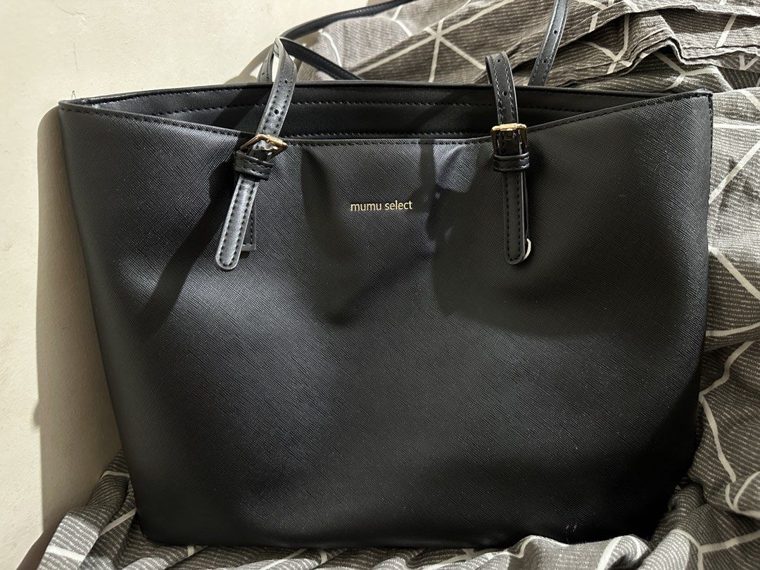 FS! Mumu Select Large Capacity Leather Totebag (Category: Luxury Bags & Wallets) located in Manila. Submitted by faebbles (Listing ID 1470524610, Image 1). Description: item is in good condition. all zippers are working perfectly fine. no damage or flaws. what you see is what you get. dm me if ineterested!.