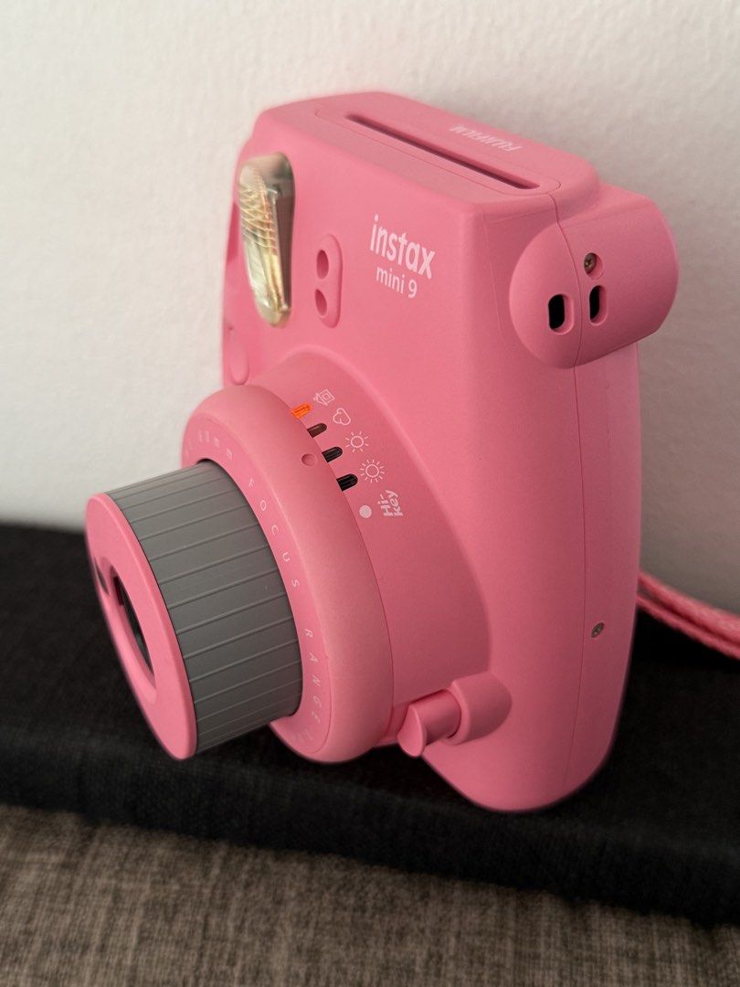 Fujifilm Instax Mini 9 (Category: Cameras) located in General Trias. Submitted by k_decluttering (Listing ID 1470362274, Image 3). Description: Instax mini 9 Flamingo Pink 🌸💖🦩🎀 ✅ Fully functional ✅ No dents, still in very good quality ✅ Like new condition. Only used for 2 packs of film total ❌ Film & batteries are NOT included Inclusions: 📷 Instax mini 9 camera 📦 Box & manual 🩷 Wrist strap ⚪️ Close-up lens attachment RFS: no longer using i