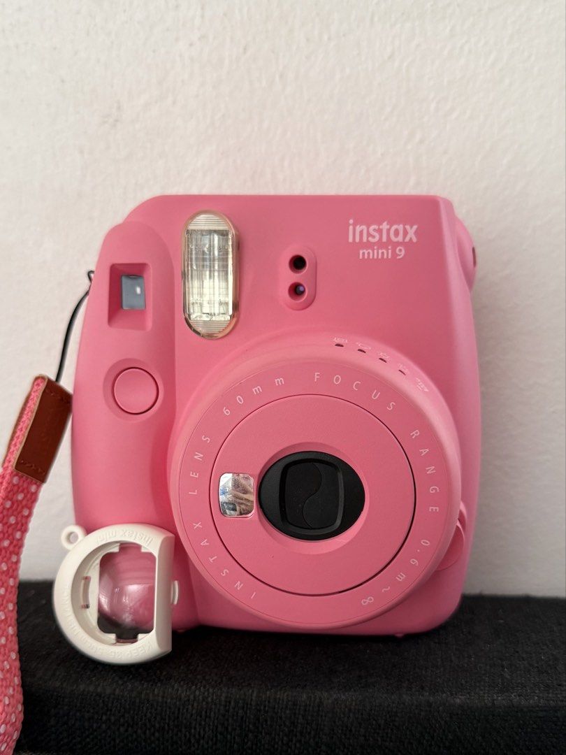 Fujifilm Instax Mini 9 (Category: Cameras) located in General Trias. Submitted by k_decluttering (Listing ID 1470362274, Image 2). Description: Instax mini 9 Flamingo Pink 🌸💖🦩🎀 ✅ Fully functional ✅ No dents, still in very good quality ✅ Like new condition. Only used for 2 packs of film total ❌ Film & batteries are NOT included Inclusions: 📷 Instax mini 9 camera 📦 Box & manual 🩷 Wrist strap ⚪️ Close-up lens attachment RFS: no longer using i
